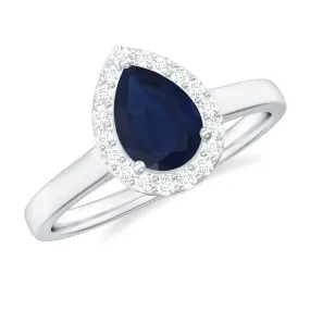 1 CT Pear Shaped Blue Sapphire and Diamond Halo Engagement Ring