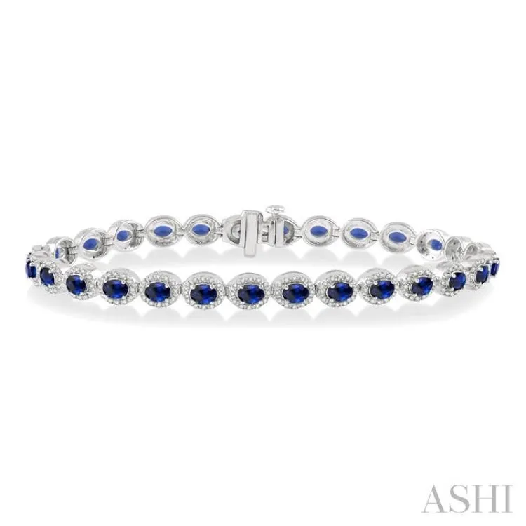 1 Ctw Round Cut Diamond & 4x3 MM Oval Cut Sapphire Precious Bracelet in 14K White Gold