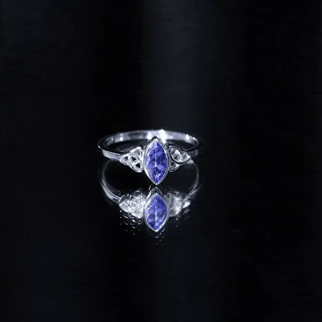 Bezel Set Marquise Cut Tanzanite Solitaire Celtic Knot Ring