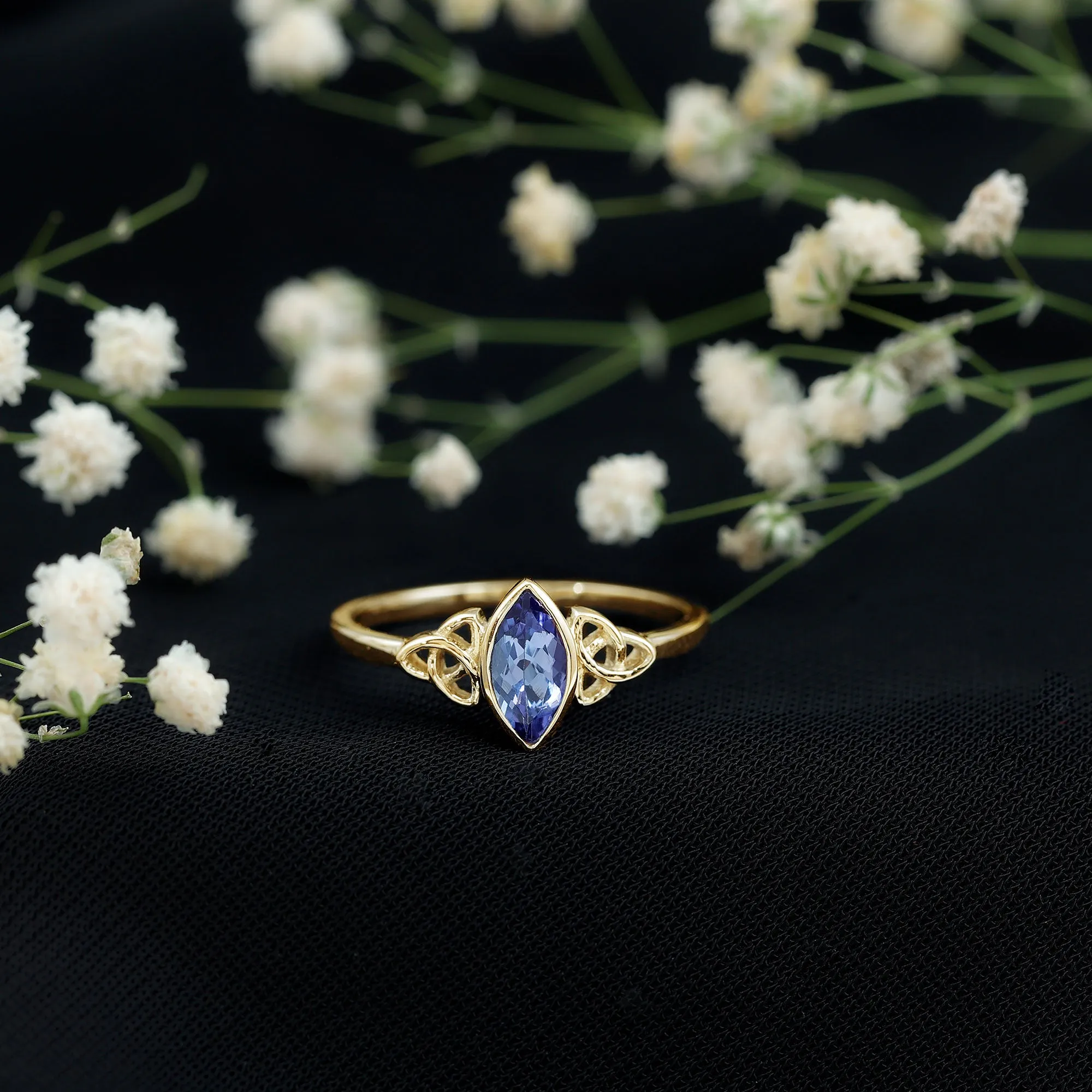 Bezel Set Marquise Cut Tanzanite Solitaire Celtic Knot Ring