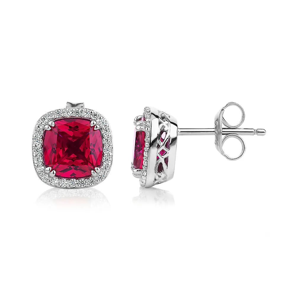 Cushion and Round Brilliant halo stud earrings with ruby simulants and 0.25 carats* of diamond simulants in sterling silver