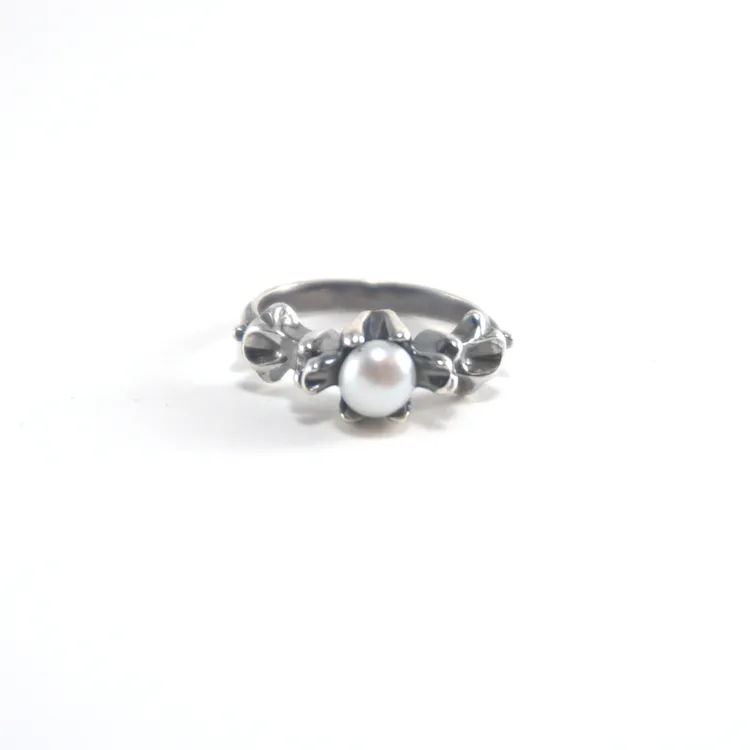 Delicate Carved Pearl Ring by Audrée H. St-Amour