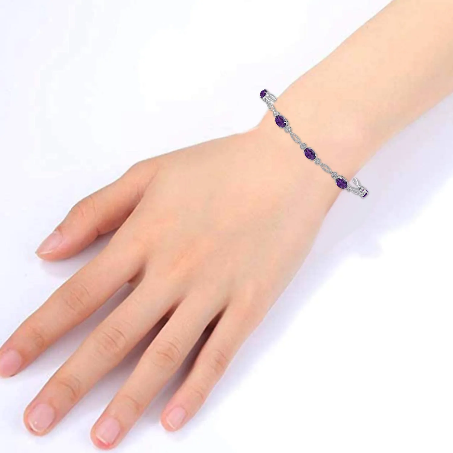 Jewelili Sterling Silver Oval Shape Amethyst Fashion Bracelet