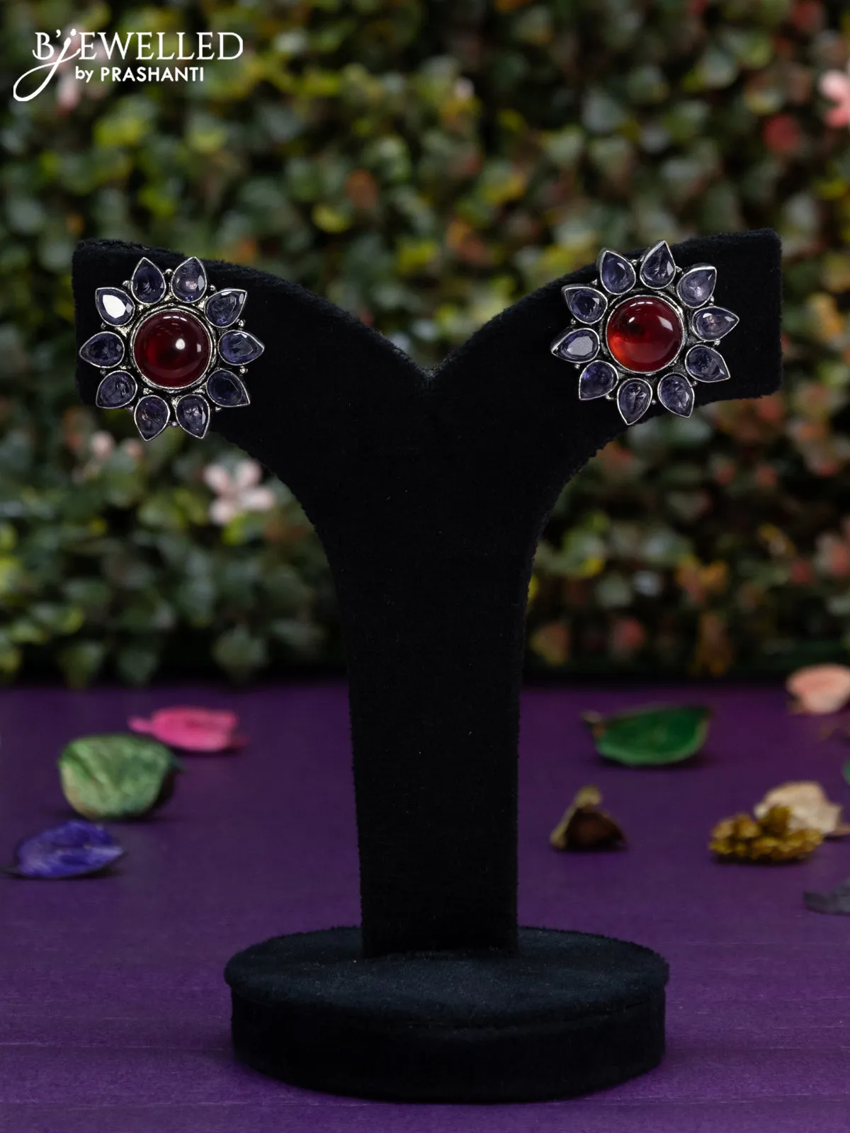 Oxidised earring floral design with ruby & violet stones