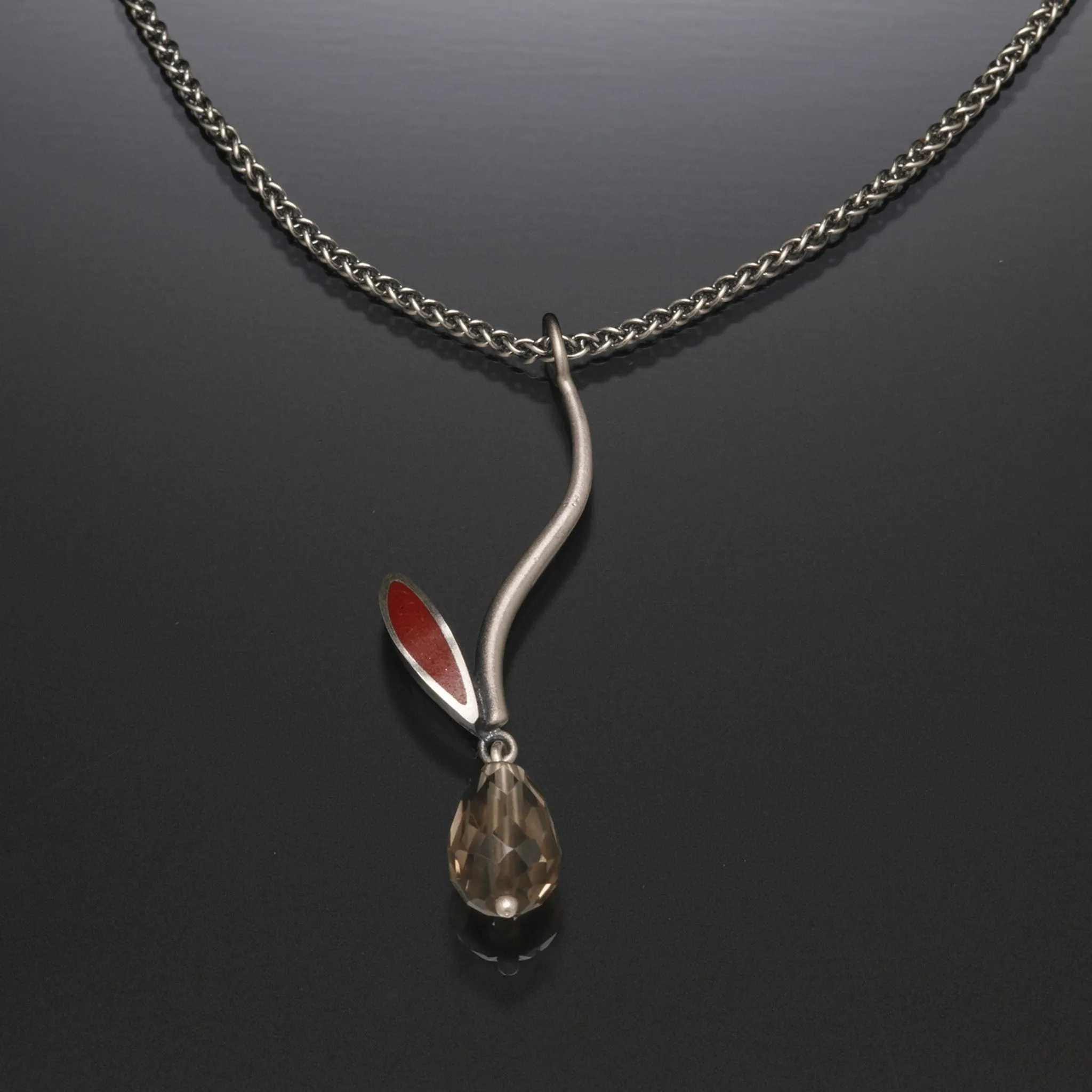 Silver stem necklace with gemstone and red inlay by Susan Kinzig