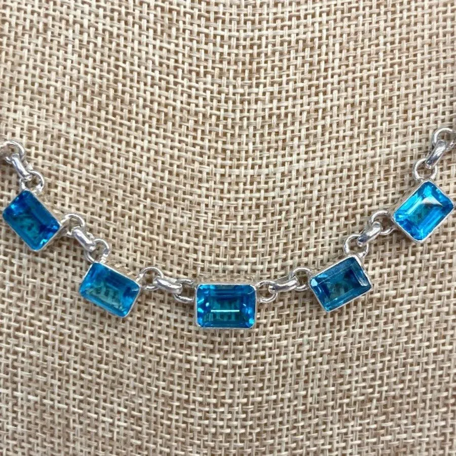 Sterling Silver And Rectangular Blue Topaz Tennis Necklace